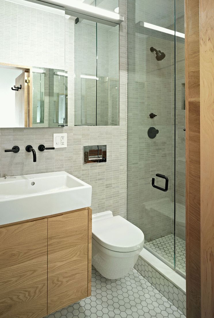 Обычно в квартирах-студиях ванную комнату оснащают душевой кабиной